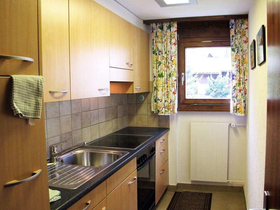 Kitchen Sink, Cabinetry, Property, Sink, Countertop, Lighting, Wood, Interior Design, Kitchen Stove, Kitchen