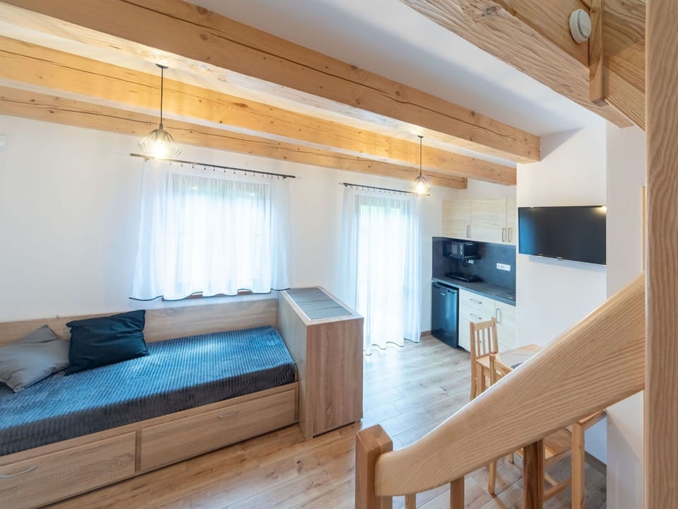 Property, Furniture, Cabinetry, Comfort, Wood, Interior Design, Flooring, Floor, Living Room, Lamp