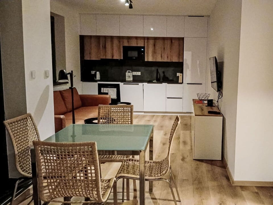 Furniture, Table, Property, Cabinetry, Chair, Couch, Countertop, Wood, Interior Design, Lighting