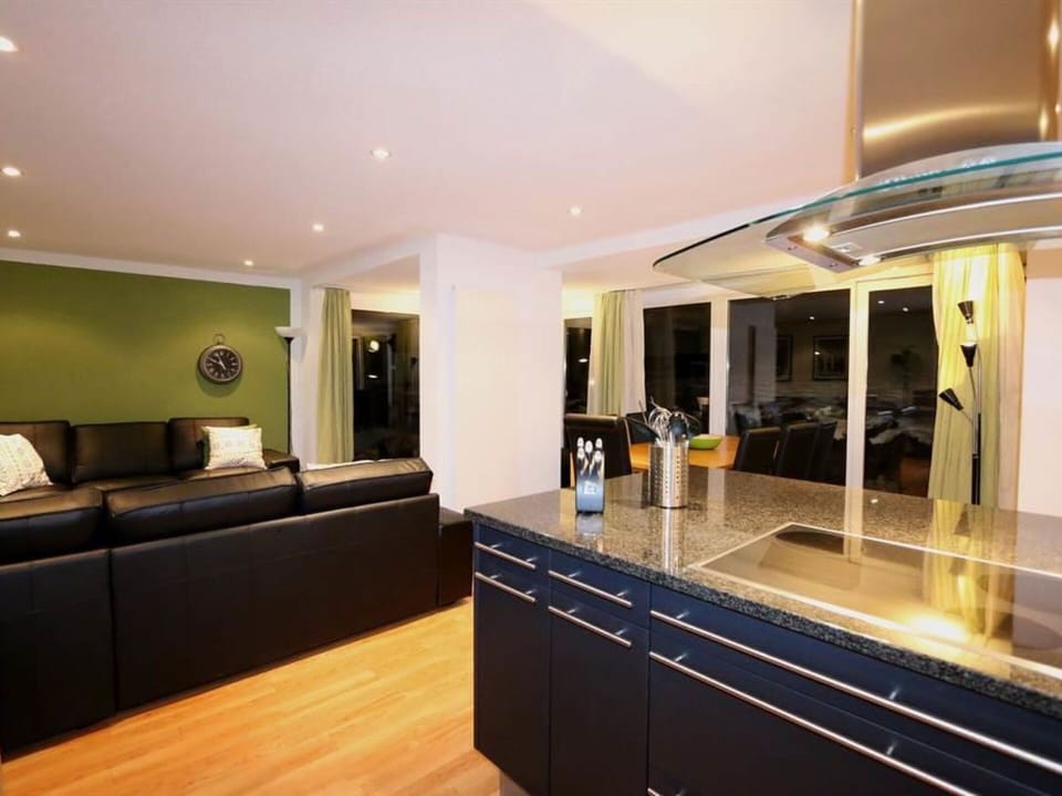 Furniture, Building, Couch, Interior Design, Table, Hall, Architecture, Flooring, Living Room, Floor