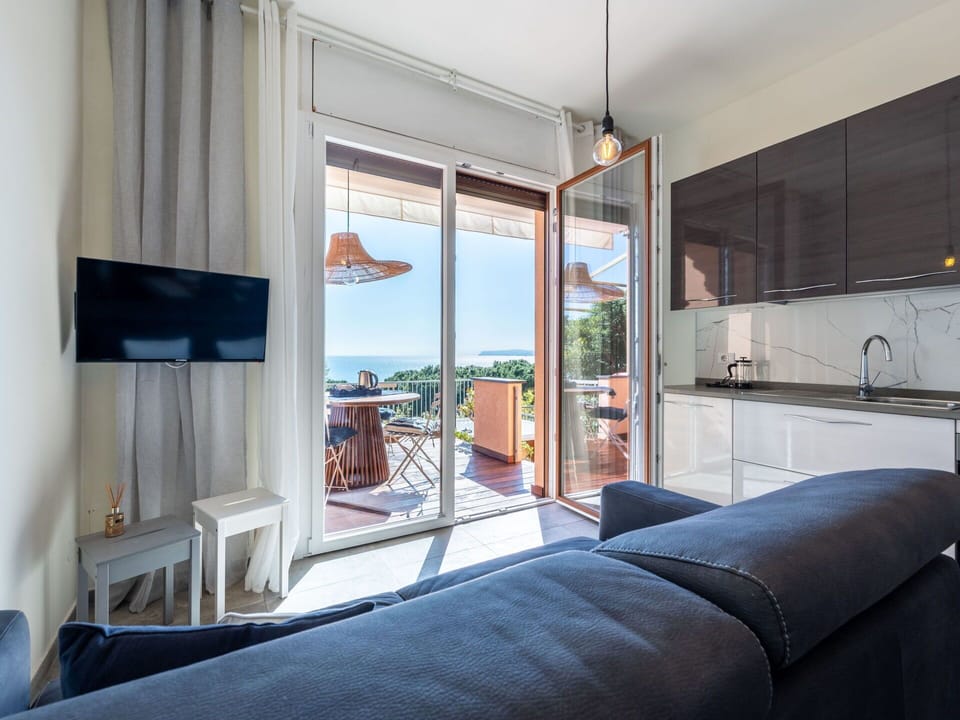 Furniture, Floor, Apartment, Chair, Hardwood, Couch, Wood Flooring, Living Room, Wood Stain