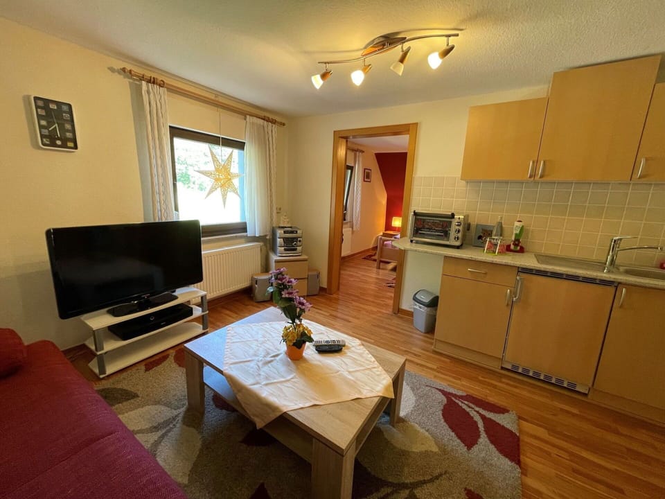 Furniture, Cabinetry, Countertop, Couch, Sink, Wood, Picture Frame, Table, Kitchen Sink, Lighting