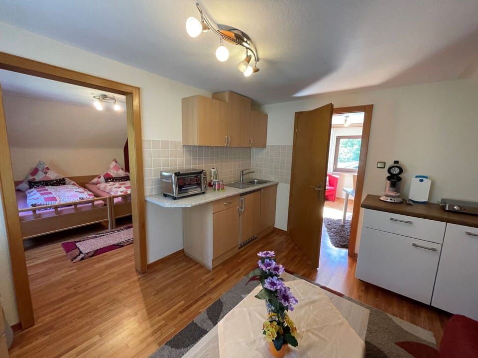 Cabinetry, Furniture, Countertop, Property, Wood, Kitchen, Flower, Drawer, Interior Design, Floor
