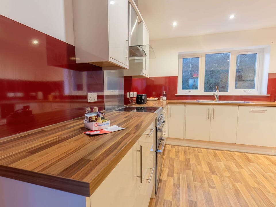 Cabinetry, Table, Furniture, Countertop, Window, Kitchen, Building, Wood, Interior Design, Floor