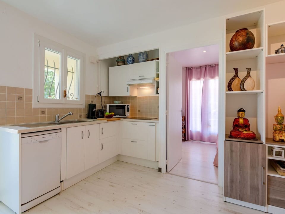 Cabinetry, Furniture, Countertop, Sink, Wood, Kitchen, Interior Design, Building, Houseplant, Flooring