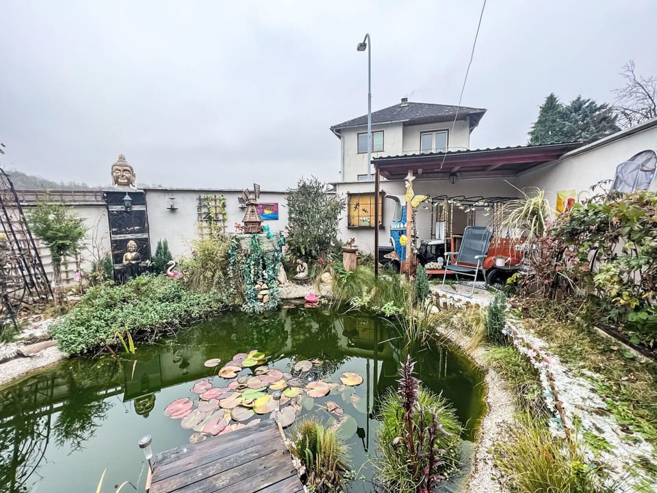 Water, Plant, Sky, Flower, Building, Cloud, Watercourse, Natural Landscape, Urban Design, Landscape