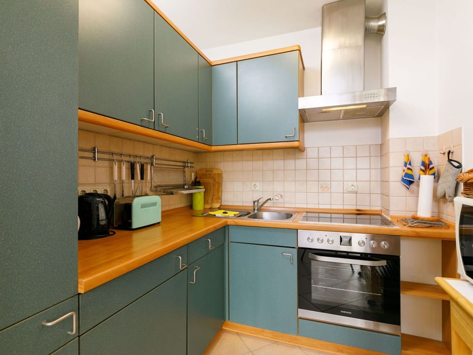 Cabinetry, Countertop, Property, Kitchen Sink, Furniture, Sink, Tap, Building, Kitchen Stove, Kitchen Appliance