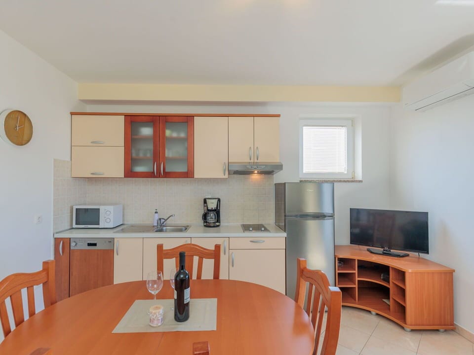 Table, Cabinetry, Furniture, Property, Countertop, Wood, Kitchen, Orange, Interior Design, Chair