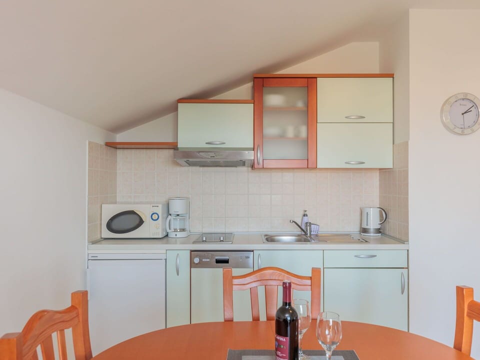 Cabinetry, Kitchen Sink, Sink, Tap, Furniture, Countertop, Plumbing Fixture, Kitchen, Interior Design, Wood