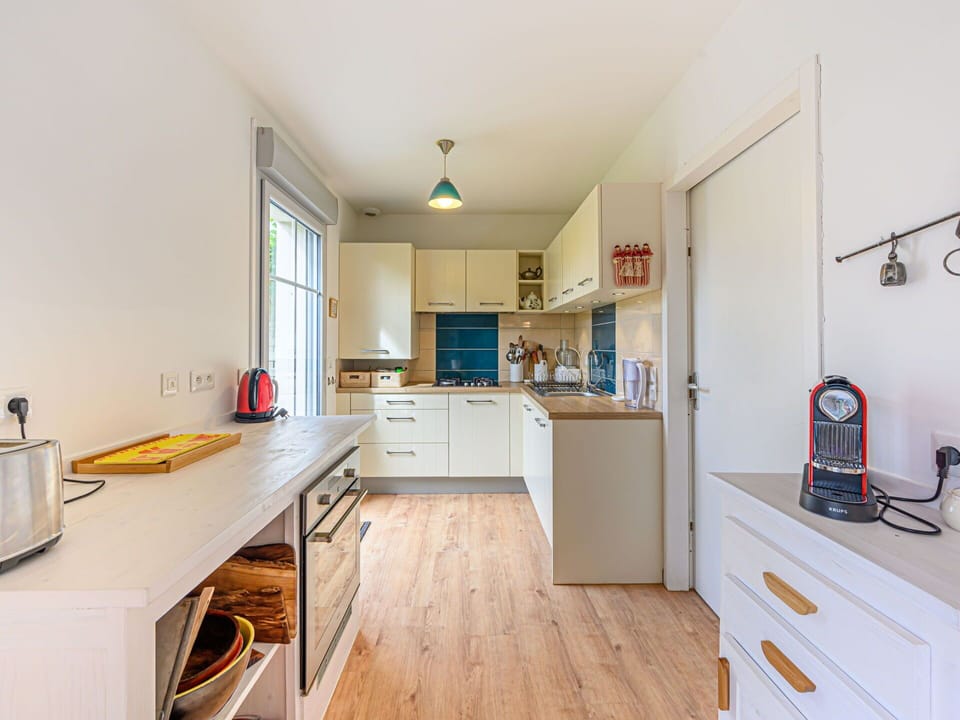 Cabinetry, Furniture, Countertop, Window, Wood, Kitchen, Building, Drawer, Floor