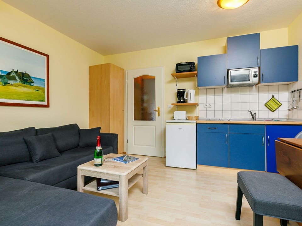 Furniture, Property, Cabinetry, Interior Design, Houseplant, Couch, Floor, Comfort, Home Appliance, Studio Couch
