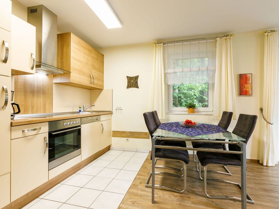 Furniture, Cabinetry, Countertop, Wood, Kitchen Stove, Window, Interior Design, Kitchen Appliance, Building, Chair