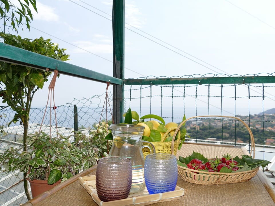 Water, Sky, Table, Furniture, Property, Chair, Azure, Outdoor Table, Outdoor Furniture, Tableware