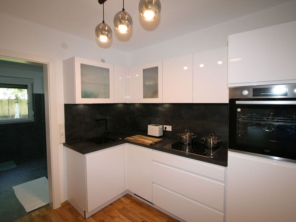Cabinetry, Countertop, Wood, Kitchen Stove, Kitchen Appliance, Kitchen, Stove, Interior Design, Home Appliance, Tap