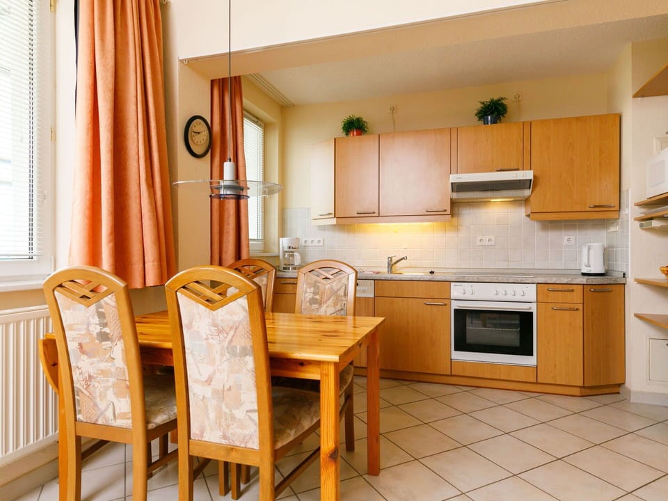 Furniture, Cabinetry, Building, Countertop, Window, Chair, Kitchen Appliance, Kitchen Stove, Wood, Curtain