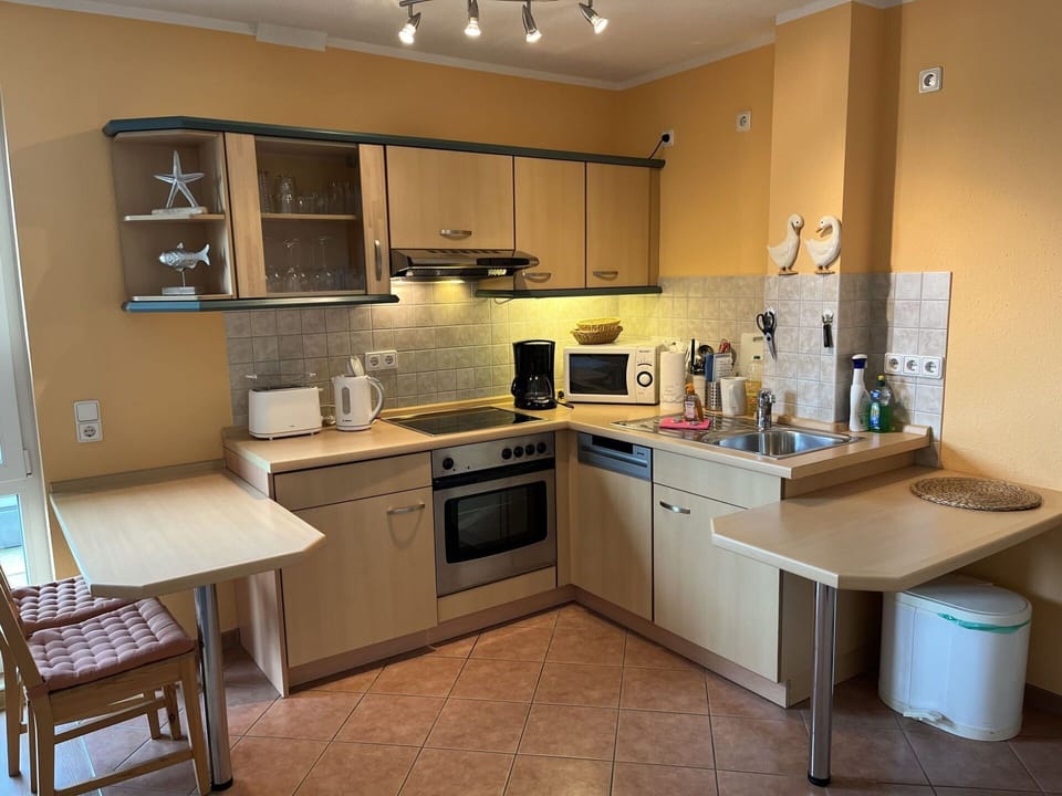 Cabinetry, Kitchen Sink, Countertop, Sink, Furniture, Tap, Kitchen Appliance, Kitchen Stove, Kitchen, Home Appliance