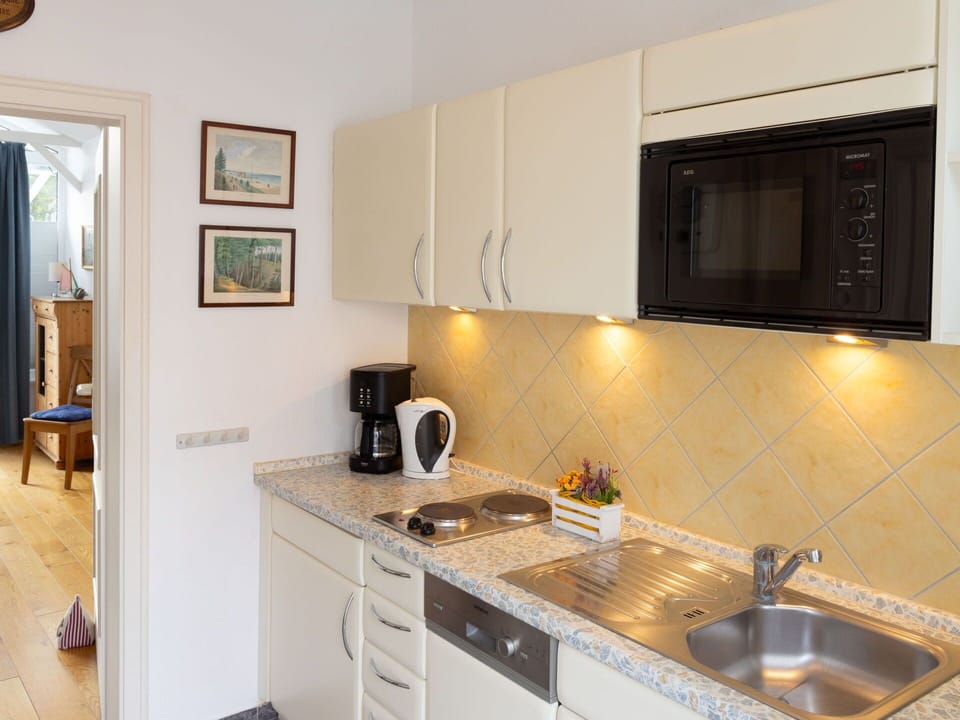 Kitchen, Kitchen Appliance, Countertop, Furniture, Major Appliance, Interior Design, Cabinetry, Wood, Flooring, Kitchen Sink