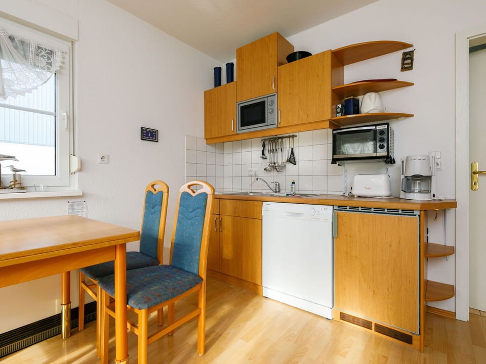 Cabinetry, Property, Furniture, Countertop, Kitchen, Wood, Table, Kitchen Stove, Kitchen Appliance, Interior Design