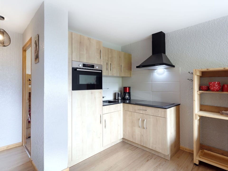 Cabinetry, Countertop, Kitchen Appliance, Kitchen, Wood, Lighting, Kitchen Stove, Home Appliance, Flooring, Floor