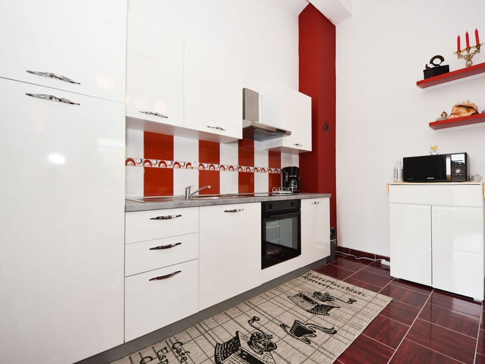 Cabinetry, Furniture, Building, Countertop, Interior Design, Drawer, Lighting, Wood, Floor, Shelving