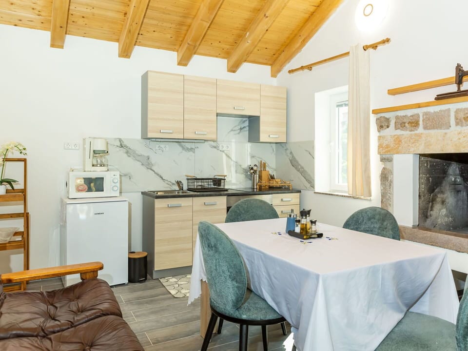 Cabinetry, Furniture, Property, Table, Countertop, Chair, Wood, Kitchen, Interior Design, Building