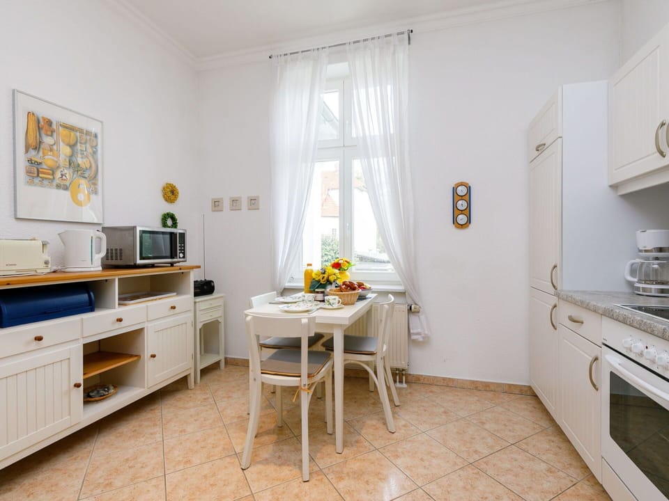 Furniture, Property, Cabinetry, Table, Window, Countertop, Interior Design, Wood, Building, Kitchen Appliance