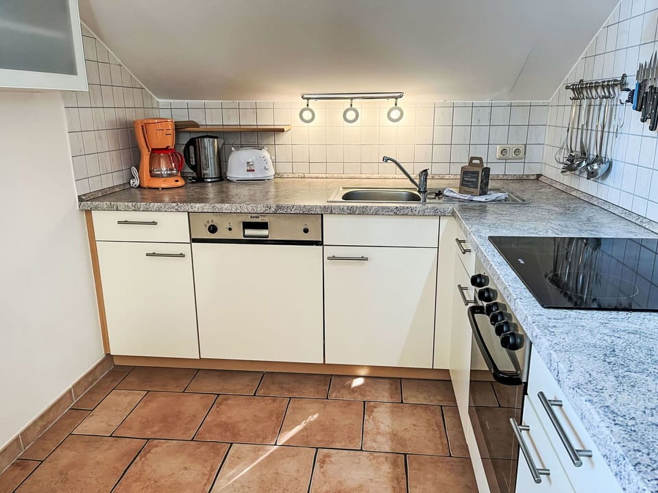 Kitchen, Flooring, Countertop, Kitchen Sink, Major Appliance, Floor, Kitchen Appliance, Plumbing Fixture, Tap, Interior Design