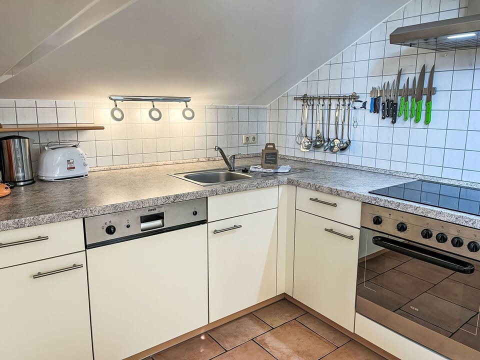 Kitchen, Kitchen Sink, Countertop, Kitchen Appliance, Major Appliance, Flooring, Plumbing Fixture, Kitchen Stove, Sink, Tap