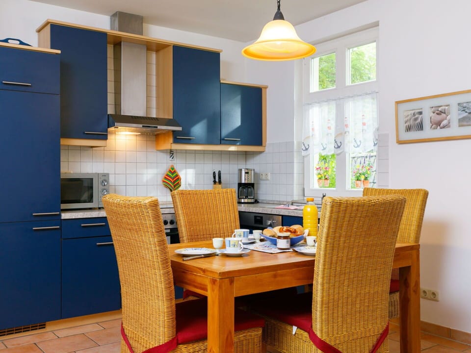 Furniture, Property, Chair, Table, Cabinetry, Interior Design, Wood, Yellow, Flooring, Floor