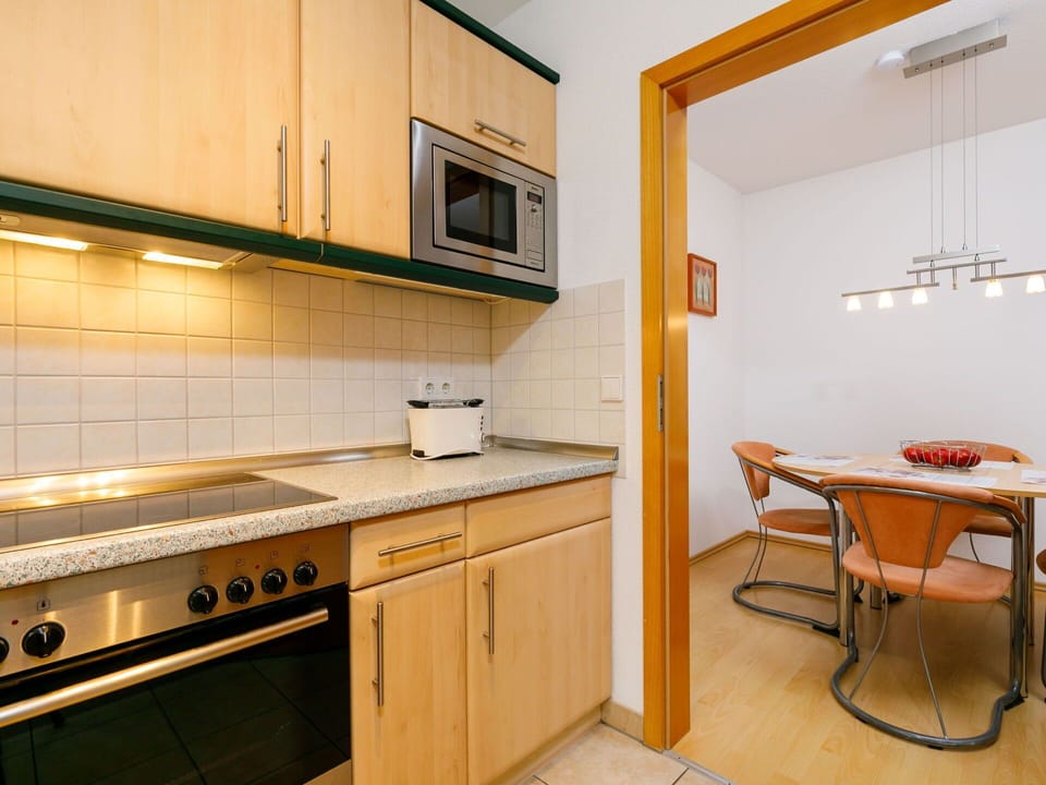 Cabinetry, Building, Property, Furniture, Countertop, Wood, Kitchen Stove, Interior Design, Kitchen, Kitchen Appliance