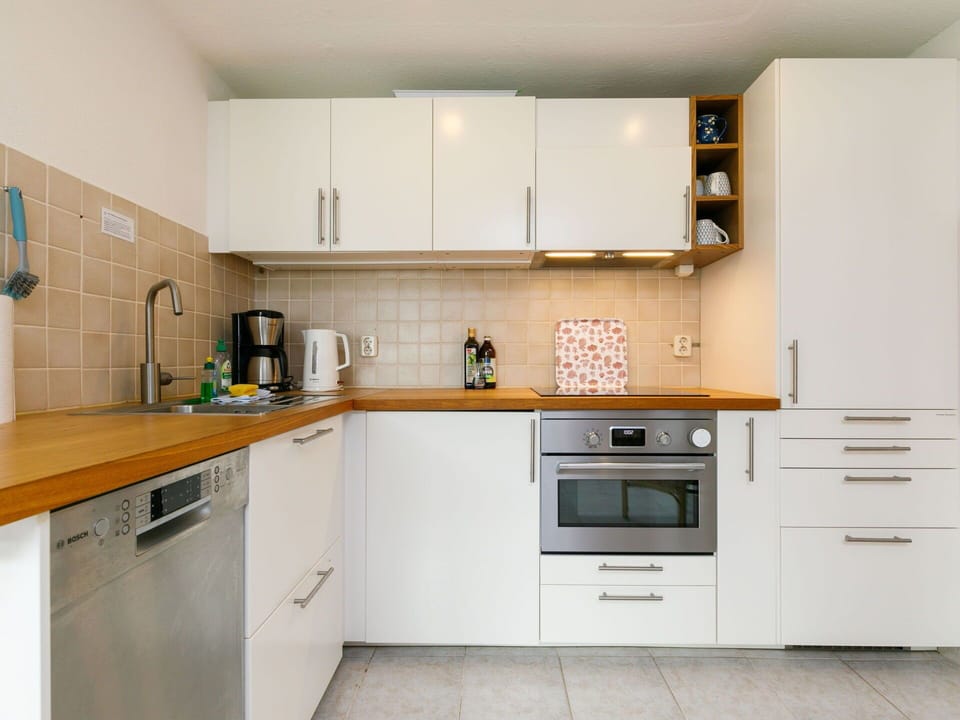 Cabinetry, Countertop, Building, Sink, Kitchen Sink, Property, Furniture, Kitchen Stove, Kitchen Appliance, Drawer