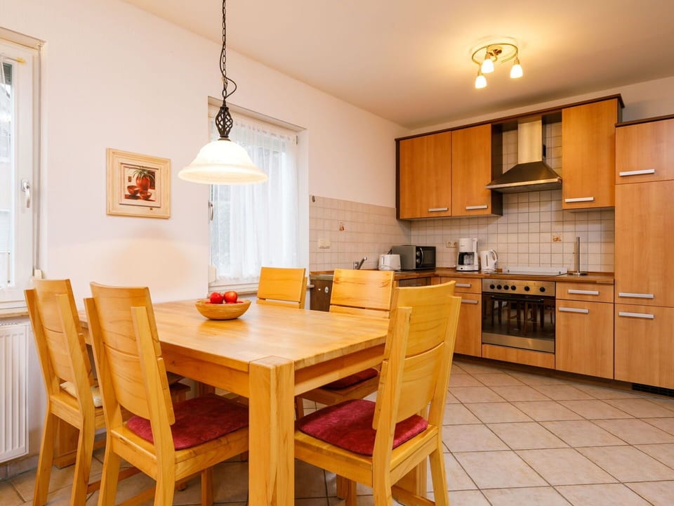 Furniture, Table, Cabinetry, Chair, Wood, Window, Countertop, Lighting, Orange, Wood Stain
