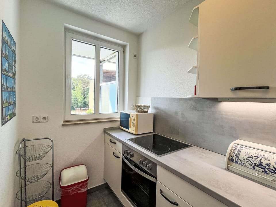 Cabinetry, Property, Window, Furniture, Countertop, Building, Kitchen, Kitchen Stove, Kitchen Appliance, Interior Design