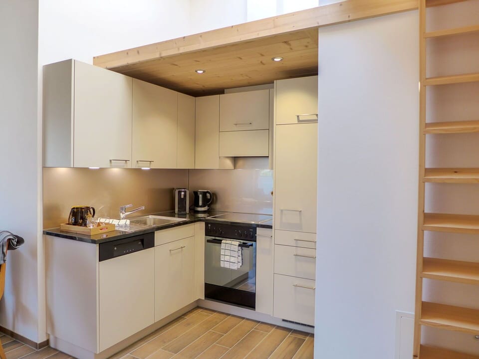 Cabinetry, Countertop, Kitchen Appliance, Kitchen Stove, Kitchen, Wood, Building, Home Appliance, Flooring, Floor