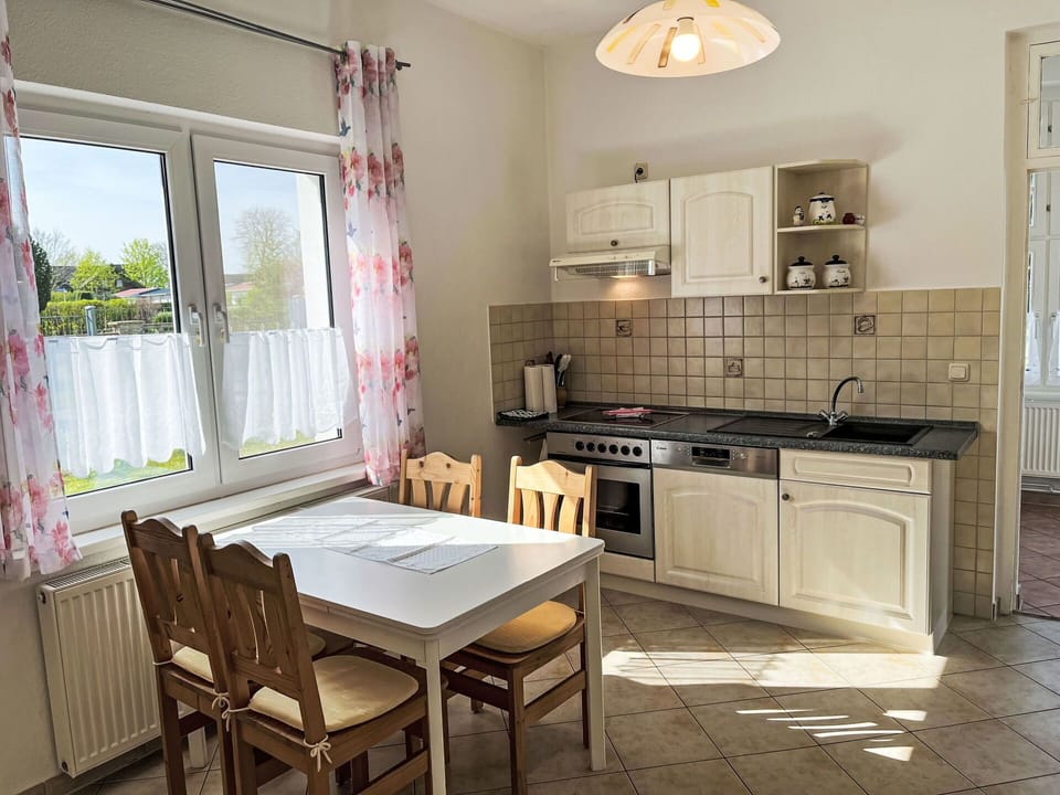 Cabinetry, Property, Sink, Countertop, Table, Furniture, Kitchen Sink, Chair, Window, Wood