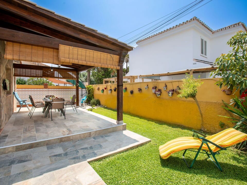 Plant, Furniture, Sky, Building, Outdoor Furniture, Shade, Chair, Window, Outdoor Table, Flowerpot