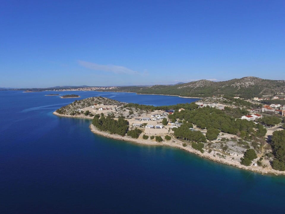 Sky, Plant, Furniture, Plant Community, Table, Natural Landscape, Chair, Land Lot, Outdoor Furniture, Tree