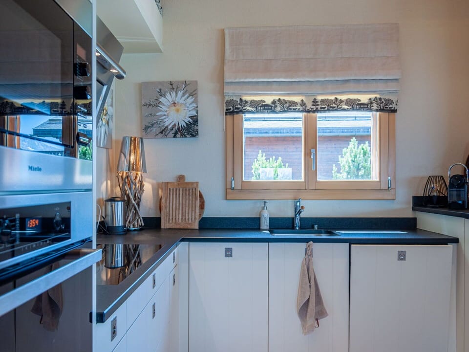 Tableware, Sky, Table, Property, Plant, Furniture, Building, Cloud, Dishware, Cup