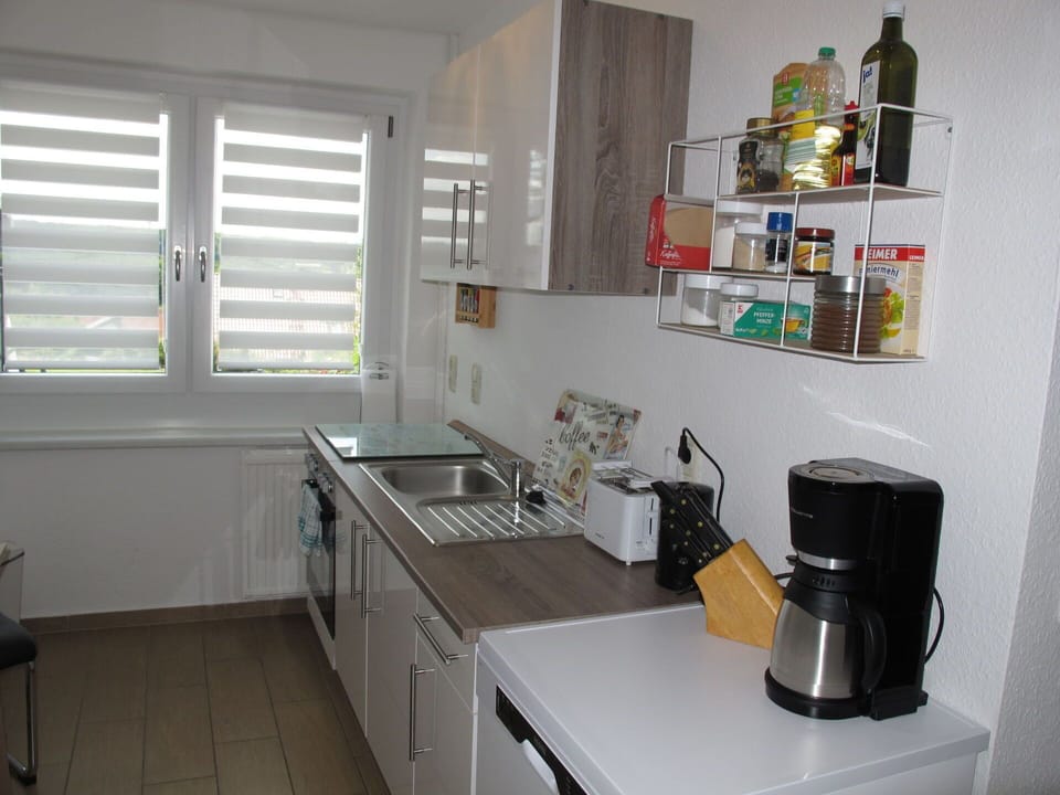 Property, Cabinetry, Kitchen Sink, Window, Countertop, Kitchen Appliance, Sink, Kitchen Stove, Interior Design, Kitchen
