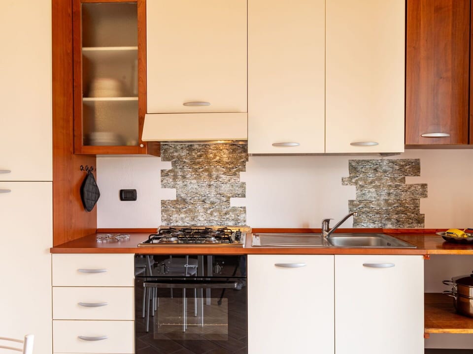 Cabinetry, Property, Countertop, Furniture, Building, Wood, Kitchen, Kitchen Stove, Kitchen Appliance, Drawer