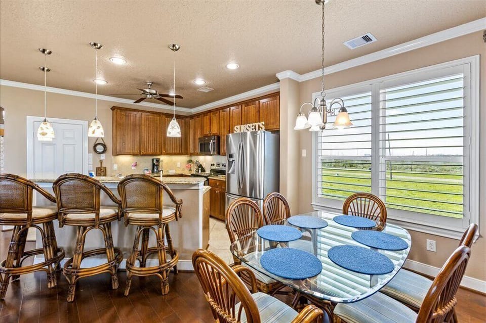 Spacious dining setup with a beautiful backdrop of the outdoors