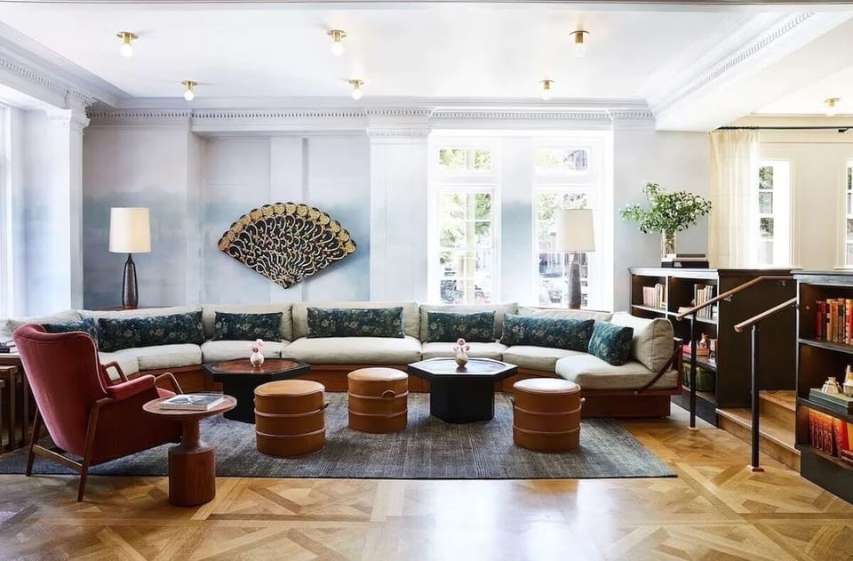 Sink into plush seating in an airy, design-forward lounge