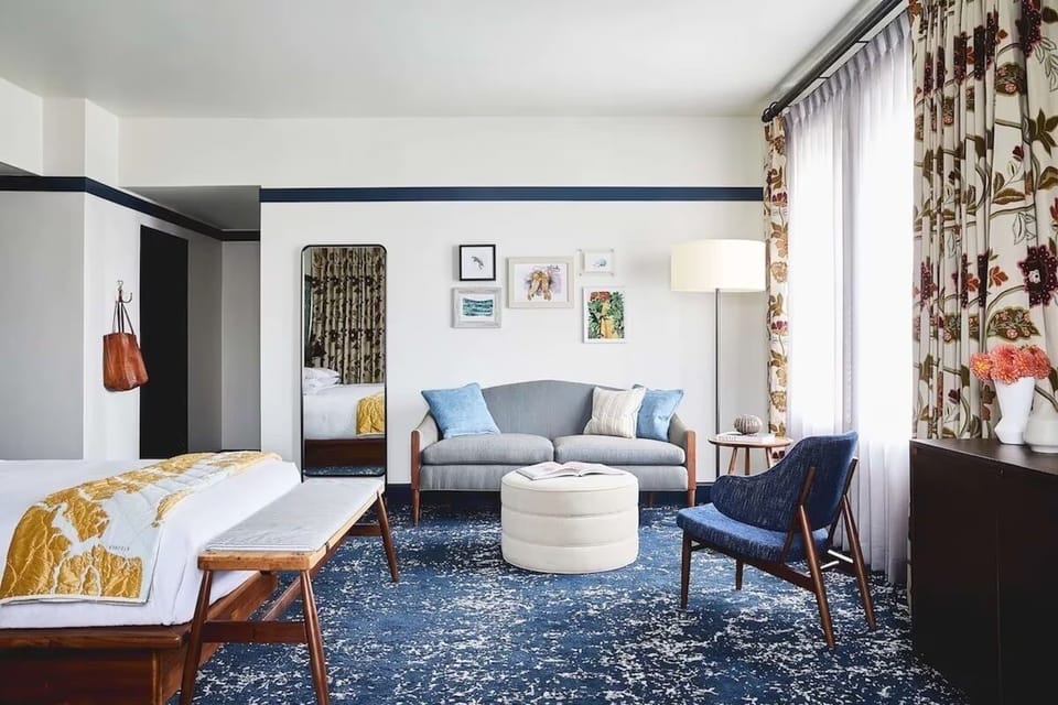 Stretch out in your airy suite with cozy lounge seating.