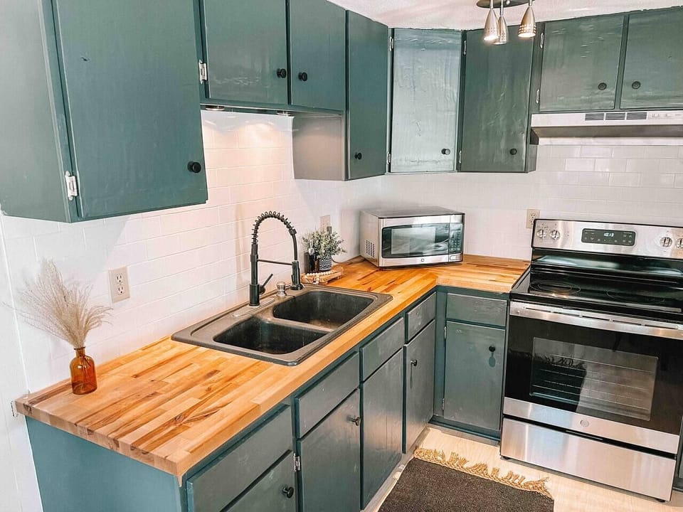 Culinary convenience at its best! Experience our kitchen's functionality with a oven, and sink for your cooking needs.