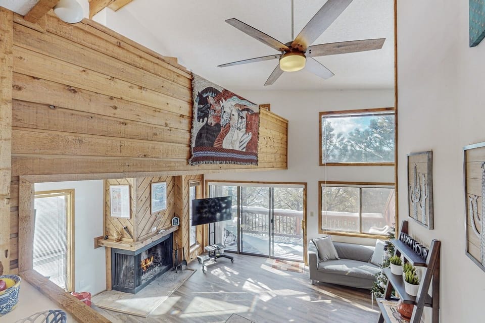 View of Living Room from dining room and Mezzanine level on the left