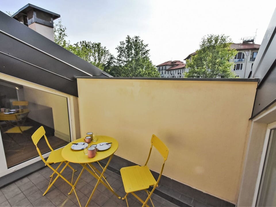 Sky, Furniture, Table, Building, Window, Chair, Shade, Tree, Wood, Yellow