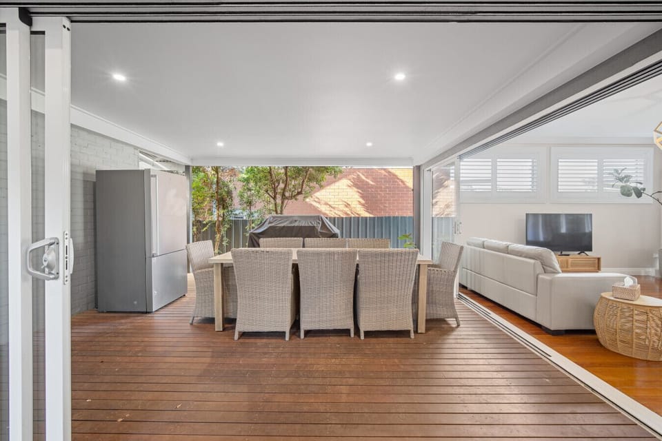 Outdoor dining with fridge and bbq