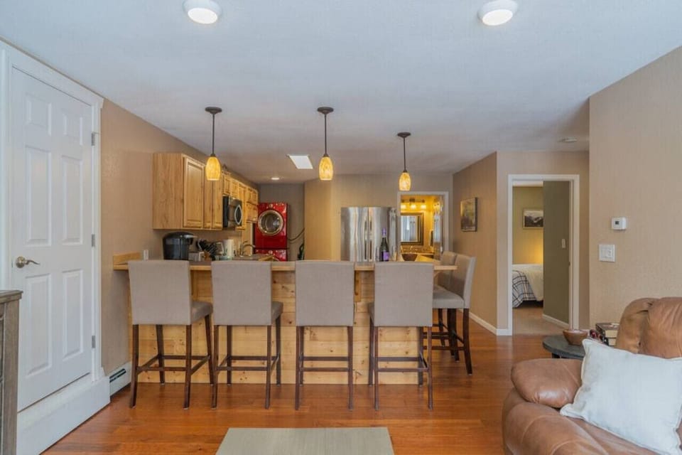 Chalet Living Room Looking at Breakfast Bar with Seating for 6