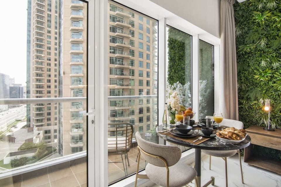Dining Retreat: Bright nook with skyline views, perfect for savoring meals and morning coffee!