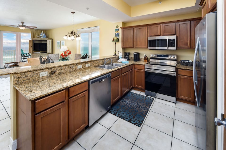 Wake up and make breakfast - Enjoy cooking in this gorgeous, fully stocked  kitchen with stainless steel appliances!